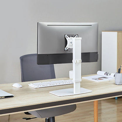 Lumi LDT67-T01 monitor stand installed holding a monitor on a desk in an office setup