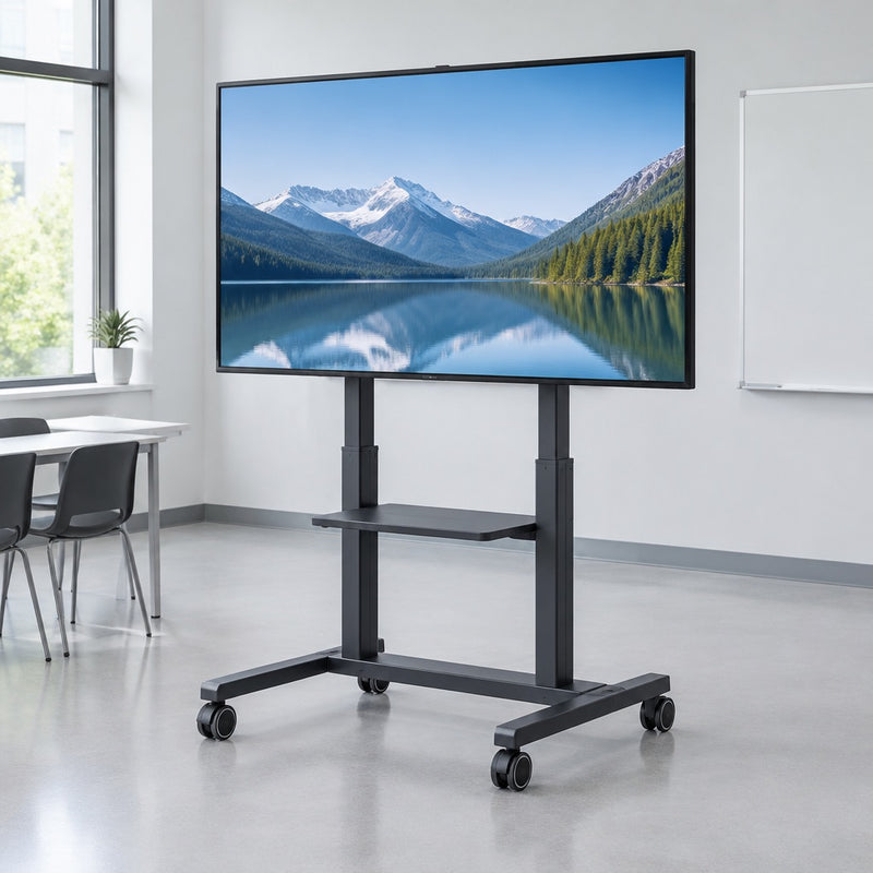 Height-adjustable mobile TV cart carrying a large display in a meeting room, supplied by Corporate AV in India