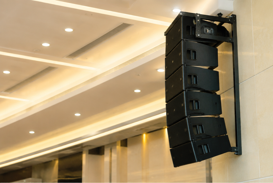 Professional public address integration in India showing speakers installed in a large facility